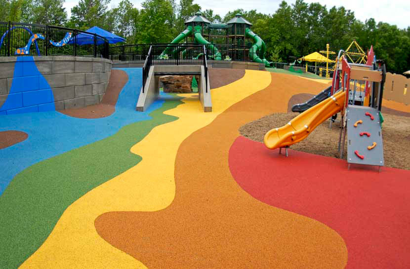 Colorful play area with slide and tunnel