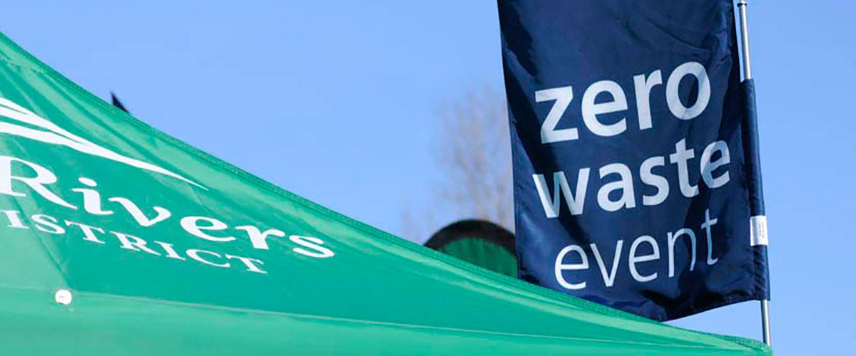 a large flag with the words 'zero waste event'