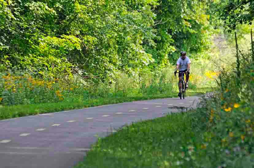 Biker on a paved trail