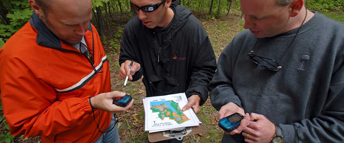 Group review a map and GPS units