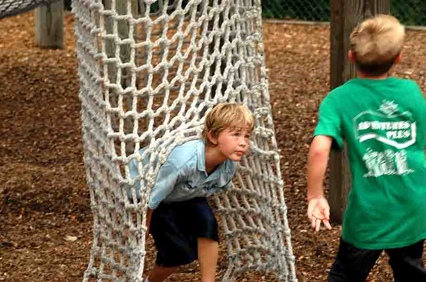 A boy in a play area