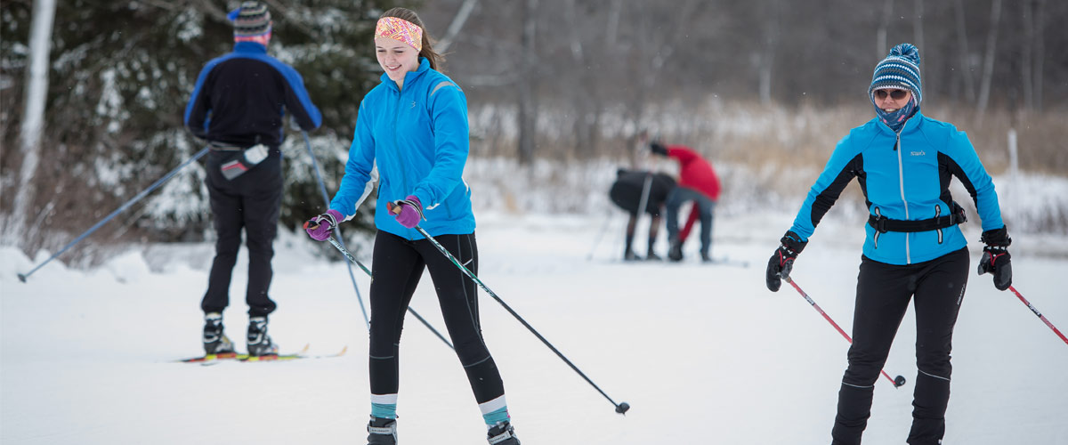 Two women cross-country skiing