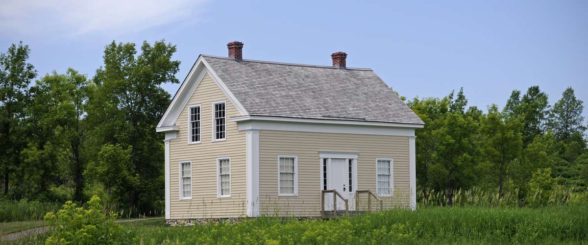 a tan colored historic home