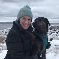 Emily Dunlap and her dog on a snowy adventure.