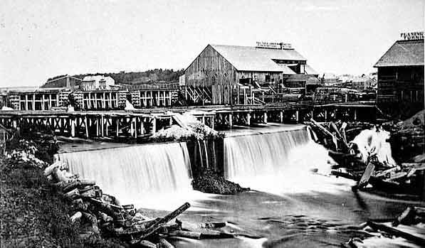 black and white photo of sawmills at St. Anthony Falls in 1860