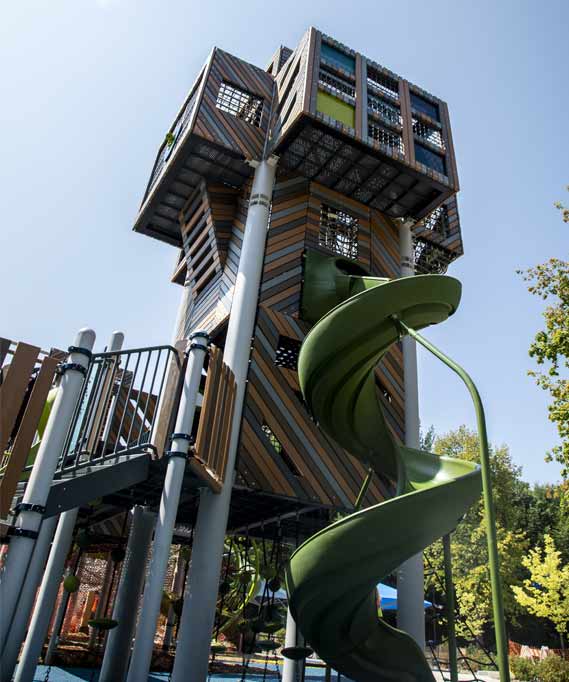 play area tower with a twisting slide.